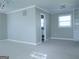 A bedroom with carpet, ceiling fan, and attached bathroom at 30 Hickory Dr, Stockbridge, GA 30281