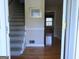Inviting foyer with hardwood floors and staircase, leading to the upper level at 30 Hickory Dr, Stockbridge, GA 30281