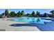 Sparkling community pool with ample lounge seating and well-maintained surroundings for residents' enjoyment at 7920 Willoughby Ct, Alpharetta, GA 30005