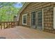 Upper deck view featuring exterior wooden finishing and a tranquil setting at 115 Ebenezer Church Rd, Fayetteville, GA 30215