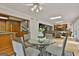 Open dining area that flows into kitchen and living room with lots of sunlight at 115 Ebenezer Church Rd, Fayetteville, GA 30215