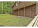 Rustic barn-style garage with wood siding and three large doors at 115 Ebenezer Church Rd, Fayetteville, GA 30215