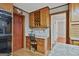 Kitchen details of a built-in desk and wine storage to add functionality and design at 115 Ebenezer Church Rd, Fayetteville, GA 30215
