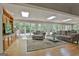 Light filled sunroom with skylights, large windows, hardwood floors and custom built-ins at 115 Ebenezer Church Rd, Fayetteville, GA 30215