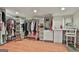 Spacious walk-in closet featuring custom shelving, ample storage space, and a built-in vanity area at 115 Ebenezer Church Rd, Fayetteville, GA 30215