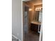 Bathroom with a light fixture, a vanity with a sink and a shower-tub combo at 130 Sandy Dr, Stockbridge, GA 30281