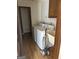 Laundry room featuring a washer and dryer and a sink, offering convenience and functionality at 130 Sandy Dr, Stockbridge, GA 30281