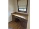 Office featuring a built-in desk with drawers and storage, plus a window for natural light at 130 Sandy Dr, Stockbridge, GA 30281