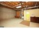 Unfinished basement with exposed ceiling, open layout, and concrete flooring at 118 Jasmine Way, Villa Rica, GA 30180