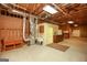 Spacious unfinished basement with open ceiling, utilities, and concrete floor at 118 Jasmine Way, Villa Rica, GA 30180