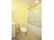 Well-lit bathroom features a toilet, vanity, and shower-tub combination at 118 Jasmine Way, Villa Rica, GA 30180