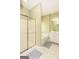 Clean bathroom featuring a shower and tub combination with a neutral color scheme at 118 Jasmine Way, Villa Rica, GA 30180