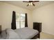 Bedroom featuring a dark colored dresser and natural light at 118 Jasmine Way, Villa Rica, GA 30180