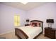 Bedroom with a full bed and a view to the backyard at 118 Jasmine Way, Villa Rica, GA 30180