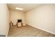 Spacious bonus room features neutral walls, recessed lighting, and wood-look flooring at 118 Jasmine Way, Villa Rica, GA 30180