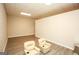 Bright bonus room with two chairs, neutral walls, recessed lighting, and wood-look flooring at 118 Jasmine Way, Villa Rica, GA 30180
