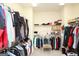 Walk-in closet with built-in shelves and clothing racks at 118 Jasmine Way, Villa Rica, GA 30180