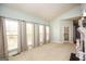 Spacious living room with multiple windows and a fireplace at 118 Jasmine Way, Villa Rica, GA 30180