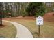 Scenic nature trail with a winding pathway, perfect for walking and enjoying the outdoors at 118 Jasmine Way, Villa Rica, GA 30180