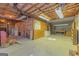 Unfinished basement storage space with exposed ceiling insulation and concrete flooring at 150 Mary Lynn Ln, Fayetteville, GA 30214