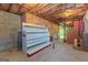 Unfinished basement with shelving and exposed insulation, ready for customization and storage at 150 Mary Lynn Ln, Fayetteville, GA 30214