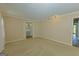 Spacious bedroom with neutral carpet features an attached ensuite bathroom, and track lighting at 150 Mary Lynn Ln, Fayetteville, GA 30214