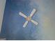 View of a painted ceiling with clouds and a white ceiling fan at 150 Mary Lynn Ln, Fayetteville, GA 30214