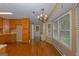 Bright dining room with hardwood floors, a bay window, and a chandelier at 150 Mary Lynn Ln, Fayetteville, GA 30214