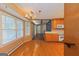 Bright dining room with hardwood floors and a view into the kitchen at 150 Mary Lynn Ln, Fayetteville, GA 30214