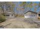 Property featuring two detached garages providing ample parking and storage space at 150 Mary Lynn Ln, Fayetteville, GA 30214