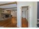 Inviting living room featuring hardwood floors and a stunning stone fireplace at 150 Mary Lynn Ln, Fayetteville, GA 30214