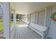 Cozy front porch with a built-in bench and charming details, perfect for relaxing and enjoying the outdoors at 150 Mary Lynn Ln, Fayetteville, GA 30214