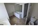 Bathroom featuring a dual sink vanity and toilet at 771 Franklin Mill Trce, Loganville, GA 30052