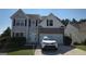 Charming two-story home featuring neutral siding, brick accents, and a well-maintained front yard at 771 Franklin Mill Trce, Loganville, GA 30052