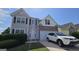 Charming two-story home featuring neutral siding, brick accents, and a well-maintained front yard at 771 Franklin Mill Trce, Loganville, GA 30052