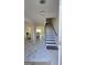 Open foyer featuring tiled floors and staircase at 771 Franklin Mill Trce, Loganville, GA 30052