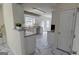 Bright kitchen featuring white cabinets and light countertops at 771 Franklin Mill Trce, Loganville, GA 30052