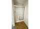 Bathroom featuring a shower with sliding doors and ceramic tile flooring at 771 Franklin Mill Trce, Loganville, GA 30052