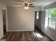 Inviting space with ample natural light and rich wood-look flooring for a warm and modern feel at 300 Wood Rd., Hampton, GA 30228
