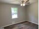 Comfortable room with a ceiling fan and ample natural light, providing a peaceful and inviting atmosphere at 300 Wood Rd., Hampton, GA 30228