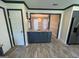 Stylish kitchen with stainless steel appliances and a view into the dining room at 1164 Interlaken Pass, Jonesboro, GA 30238