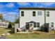 Charming backyard features a cozy patio with outdoor seating and lush green lawn at 375 Crider Ct, Woodstock, GA 30188