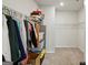 Walk-in closet with shelving providing ample storage for an organized wardrobe at 375 Crider Ct, Woodstock, GA 30188