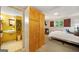 Bedroom featuring large wardrobe, a window, and an ensuite bathroom at 2406 Redfield Dr, Norcross, GA 30071