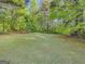 Spacious and well-maintained backyard, perfect for outdoor activities and relaxation at 242 Hickory Rd, Fayetteville, GA 30214