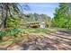Single story brick home with an attached two car garage, on a large lot at 242 Hickory Rd, Fayetteville, GA 30214