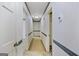 Hallway features carpet, decorative walls and multiple entryways at 242 Hickory Rd, Fayetteville, GA 30214