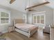 Spacious main bedroom with vaulted ceiling, ceiling fan, and plenty of natural light at 319 S Mount Carmel Rd, Mcdonough, GA 30253
