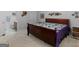 Inviting bedroom features carpeted floor and is attached to an en-suite bath for convenience and privacy at 307 Gladstone Dr, Mcdonough, GA 30253