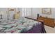 Bedroom with wood furniture, neutral walls, carpeted floors, shuttered windows, and a comfortable, inviting feel at 307 Gladstone Dr, Mcdonough, GA 30253